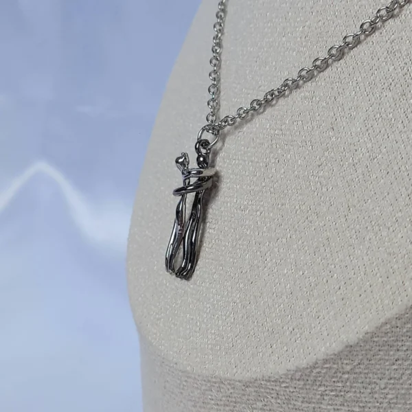 Silver Necklace with Hugging Figures